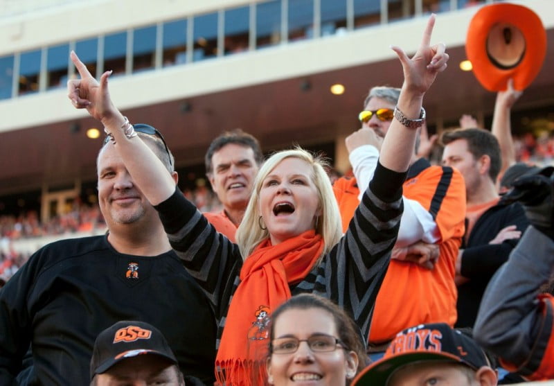 Nov 17 2012 Stillwater OK USA Oklahoma State Cowboys fans cheer during the second quarter against the Texas Tech Red Raiders at Boone Pickens Stadium. Mandatory Credit Richard Rowe US PRESSWIRE