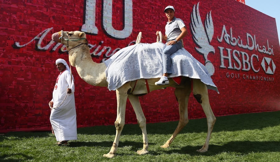 Oh look it's Rickie Fowler on a dang camel. (Getty)