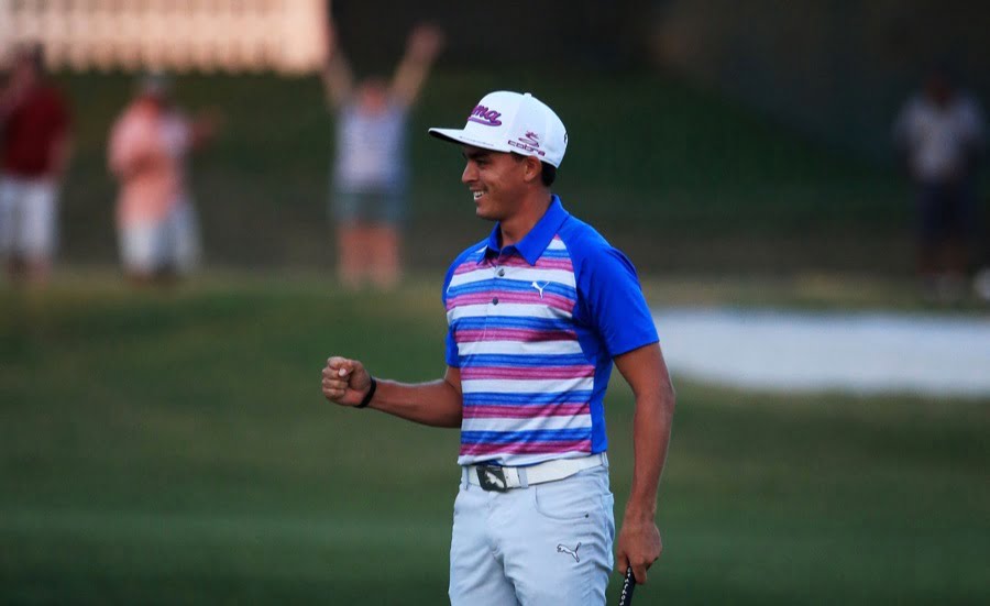 PONTE VEDRA BEACH, FL - MAY 10:  Rickie Fowler celebrates as he wins the playoff in the final round of THE PLAYERS Championship at the TPC Sawgrass Stadium course on May 10, 2015 in Ponte Vedra Beach, Florida.  (Photo by Sam Greenwood/Getty Images)