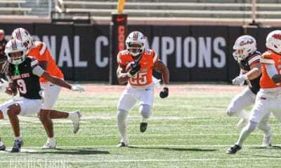 [Ayo Adeyi makes a play during OSU's 2026 spring game.]