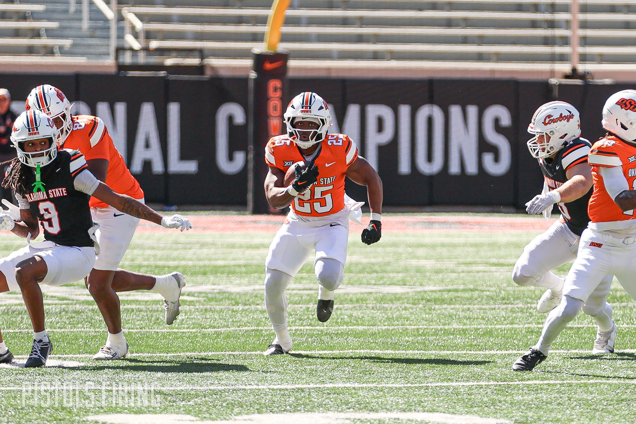 [Ayo Adeyi makes a play during OSU's 2026 spring game.]